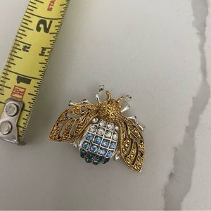 Clear and blue rhinestone gold and silver tone bee brooch